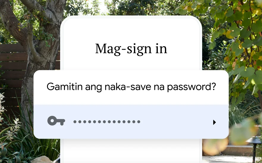 Hinihiling ng page sa pag-sign in para sa pagpapa-reserve ng biyahe na gumamit ng naka-save na password. Isang eksena ng kalikasan ang nasa background.